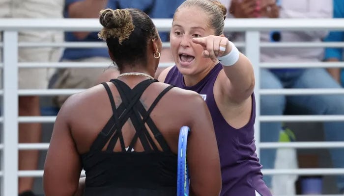 Jelena Ostapenko argues with Taylor Townsend following their second-round match at the US Open. — AFP/File