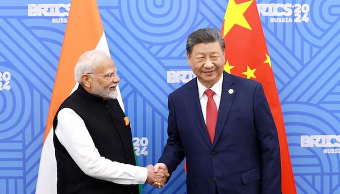 Chinese President Xi Jinping and India Prime Minister Narendra Modi meet on the sidelines of the BRICS summit in Kazan, Russia, October 23, 2024. — Reuters