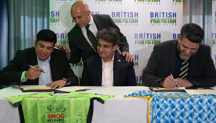 Lahore Qalandars owner Sameen Rana (left) and Warwickshire County Cricket Club Finance Director Abraham Khan sign an MoU on August 31, 2025. — Reporter
