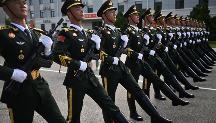 Chinese military personnel take part in a rehearsal ahead of a vast parade on September 3, 2025, in Beijing. — AFP