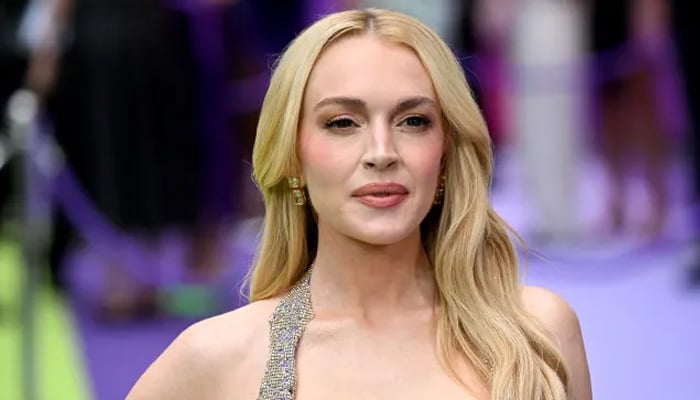 Lindsay Lohan beams alongside husband Bader Shammas at the US Open