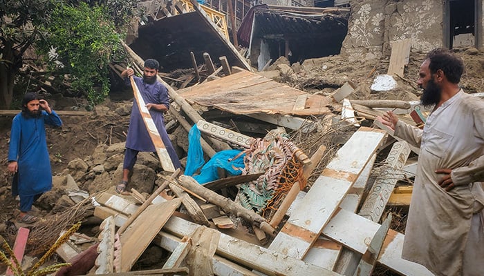 Afghan men search for their belongings amidst the rubble of a collapsed house after a deadly magnitude-6 earthquake that struck Afghanistan around midnight, in Dara Mazar, in Kunar province, Afghanistan, September 1, 2025. — Reuters