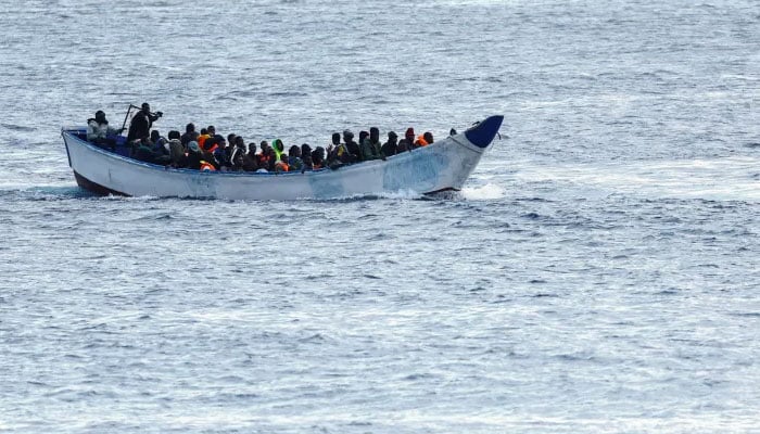 This undated photo shows an overcrowded boat transporting people across the sea. — Reuters