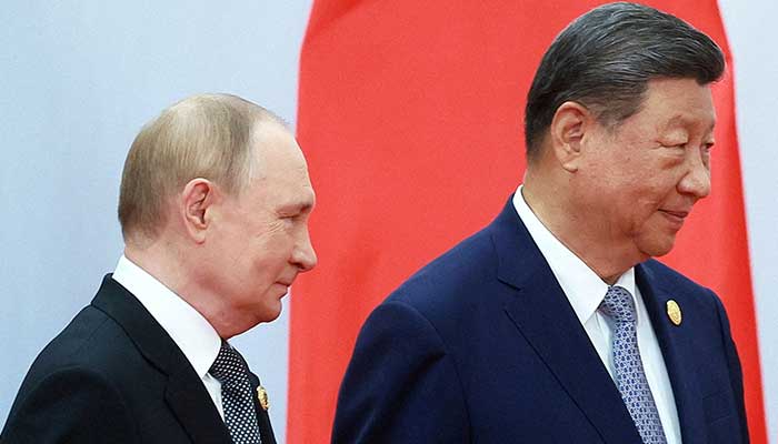 Russian President Vladimir Putin and Chinese President Xi Jinping take part in a photo ceremony at the SCO summit in Tianjin, China, September 1, 2025. — Reuters