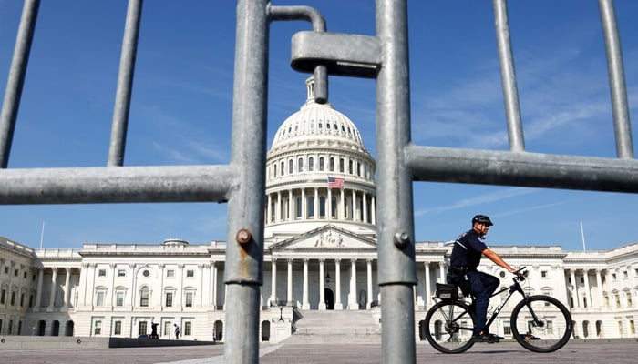 A US Capitol Police officer patrols the east front of the US Capitol in Washington, US September 15, 2021. — Reuters