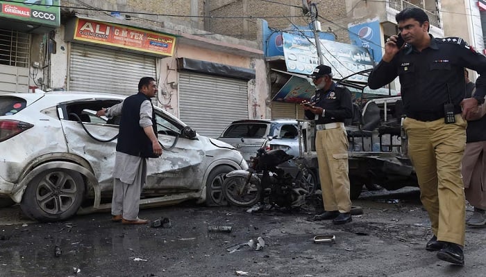 Police officers gather as they survey after a blast in Quetta on April 10, 2023. —Reuters