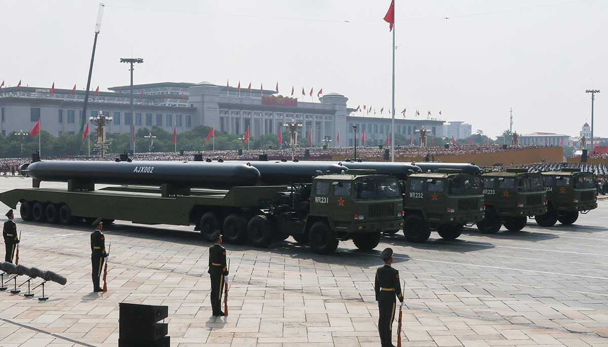 Members of the Peoples Liberation Army stand as unmanned AJX002s pass by during a military parade to mark the 80th anniversary of the end of World War II, in Beijing, China, September 3, 2025. — Reuters