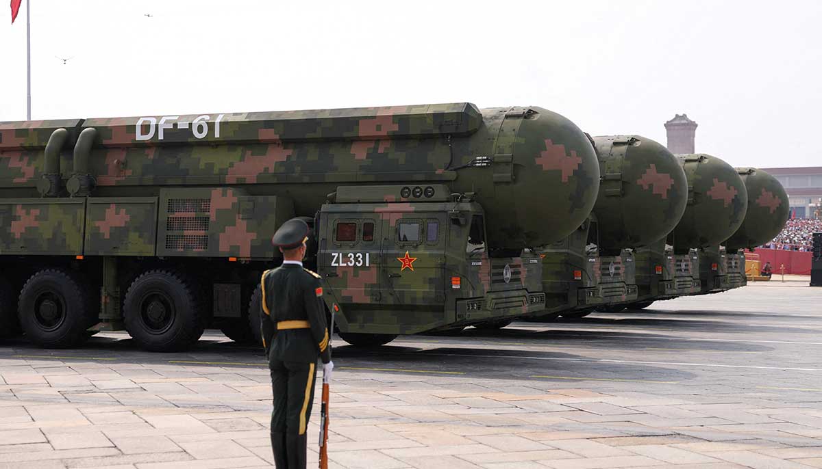 A member of the Peoples Liberation Army stands as the strategic strike group displays DF-61 nuclear missiles during a military parade to mark the 80th anniversary of the end of World War II, in Beijing, China, September 3, 2025. 1 Reuters