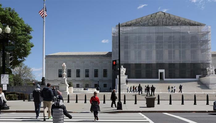 People walk near US Supreme Court building in Washington, DC, US, April 8, 2025. — Reuters