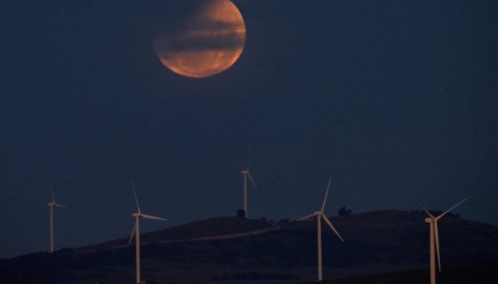 A lunar eclipse turns the Moon red near the Australian capital city of Canberra on March 14, 2025. — AFP