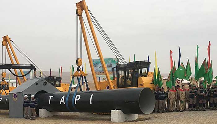 Workers attend the launching ceremony of construction work of the TAPI project on a section of a natural gas pipeline, near the town of Serhetabat, Turkmenistan. — Reuters/File