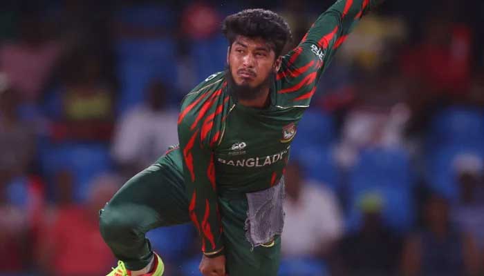 Bangladeshs Rishad Hossain bowls during Mens T20 Cricket World Cup 2024 in a match against Afghanistan at Arnos Vale Ground on June 24, 2024. — AFP