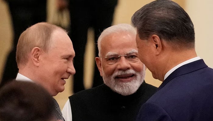 Indian Prime Minister Narendra Modi talks with Russian President Vladimir Putin and Chinese President Xi Jinping ahead of the SCO Summit 2025 at the Meijiang Convention and Exhibition Centre in Tianjin, China, September 1, 2025. — Reuters