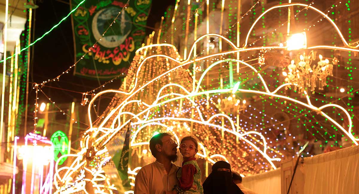 Residents visit an illuminated street ahead of Eid-e-Milad-ul-Nabi, the birth anniversary of Prophet Muhammad (PBUH), in Karachi, September 5, 2025. — Reuters