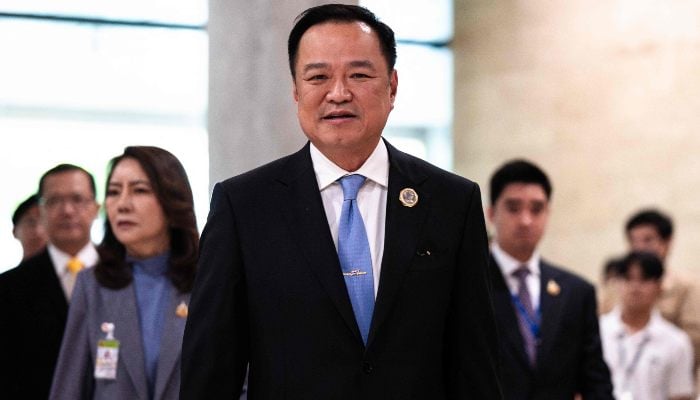 Bhumjaithai Party leader Anutin Charnvirakul arrives at parliament in Bangkok on September 5, 2025. — AFP
