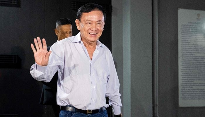 Thailands former Prime Minister Thaksin Shinawatra leaves the Pheu Thai Party headquarters in Bangkok on August 29, 2025. — AFP