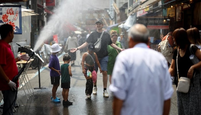 Tourists at Tsukiji Outer Market, a popular sightseeing spot, Tokyo, Japan, Aug 22, 2025. — Reuters