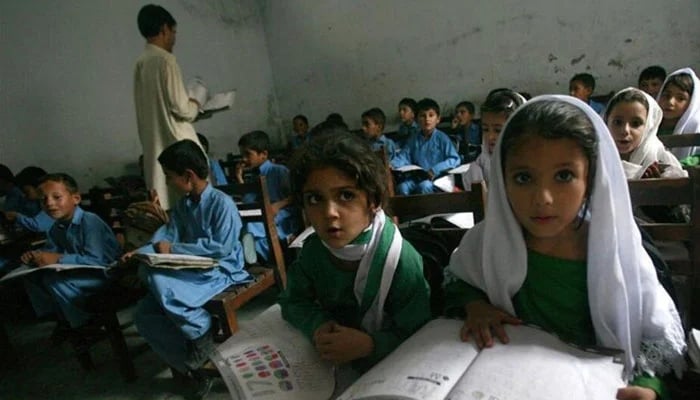 Image shows school students attending a class in Khyber Pakhtunkhwas Buner district. — Reuters/File