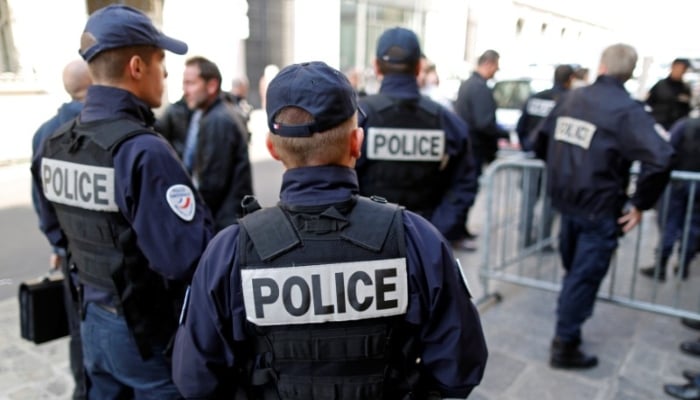 French police gather outside a local police station in Paris, France, October 11, 2016. — Reuters