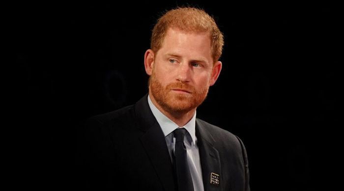 Prince Harry looks emotional during UK visit