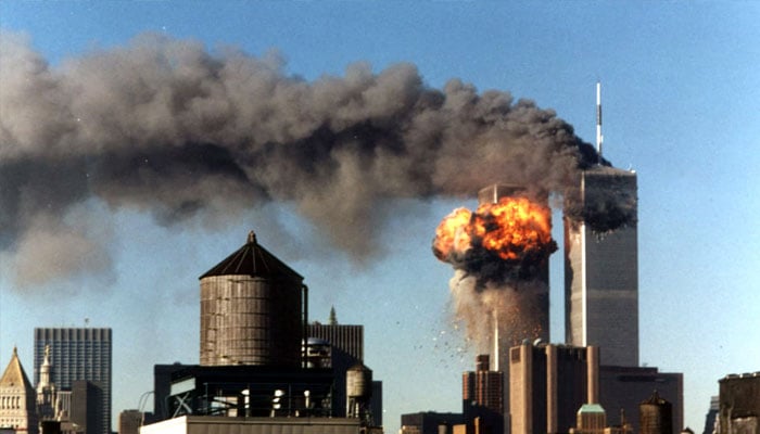A ball of fire erupts from one of the towers of New Yorks World Trade Center as a hijacked airliner is deliberately crashed into it, September 11, 2001. — Reuters