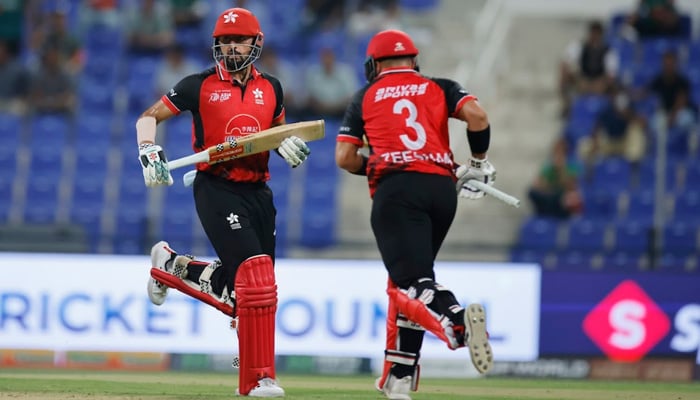 Hong Kongs Anshuman Rath (left) and Zeeshan Ali run between the wickets during their ACC Mens T20 Asia Cup 2025 match against Bangladesh at the Zayed Cricket Stadium in Abu Dhabi on September 11, 2025. — ACC