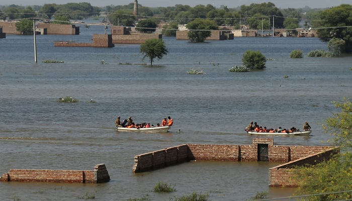 Army troops rescue flood-affected villagers by boats in Jalalpur Pirwala of Multan district in Punjab on Sept 10, 2025. — AFP