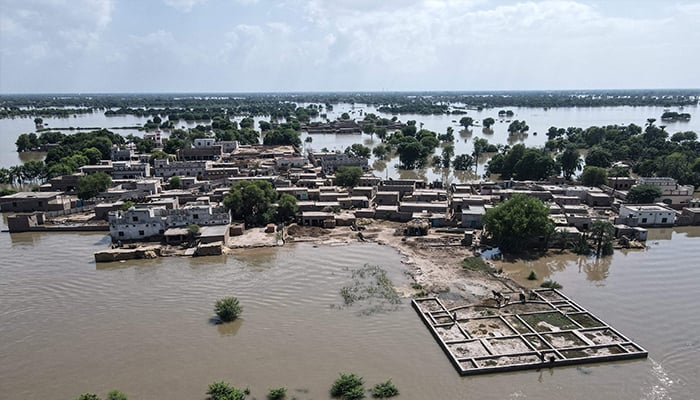 An aerial view shows partially submerged residential houses in Jalalpur Pirwala, in the Multan district of Punjab on September 9, 2025. — AFP