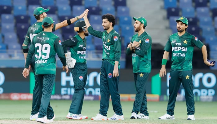 Pakistans Sufiyan Muqeem celebrates a wicket with teammates during the Asia Cup 2025 match against Oman at Dubai International Stadium on September 12, 2025. — ACC