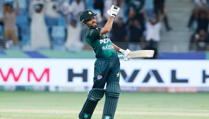 Pakistans Mohammad Harif celebrates reaching half-century during the Asia Cup 2025 match against Oman at the Dubai International Cricket Stadium in Dubai on September 12, 2025. — ACC