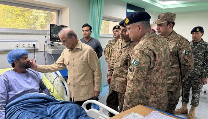 Prime Minister Shehbaz Sharif meets injured security personnel during his visit to Combined Military Hospital in Bannu, Khyber Pakhtunkhwa, September 13, 2025. — X/@PTVNewsOfficial