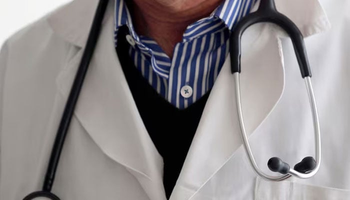 A photo illustration shows a general practitioner with a stethoscope in a doctors office in Bordeaux January 7, 2015. — Reuters
