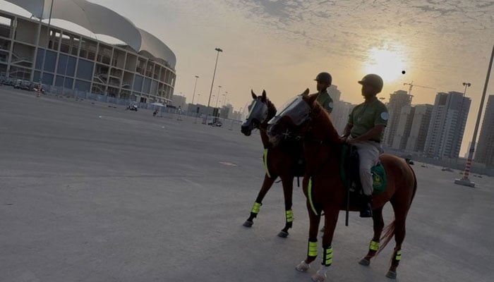 Dubai Police horse riders patrol around the stadium, monitoring unruly fans and rule-breakers ( photo sibte Arif )