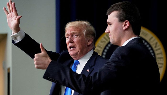 US President Donald Trump concludes an onstage interview with moderator Charlie Kirk, founder of Turning Point USA, during a youth forum titled Generation Next, at the White House in Washington, US March 22, 2018. — Reuters