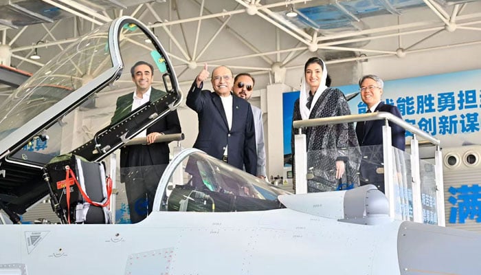 President Asif Ali Zardari gestures during his visit to Aviation Industry Corporation of China (AVIC) in Beijing, China, September 14, 2025. — X@PresOfPakistan