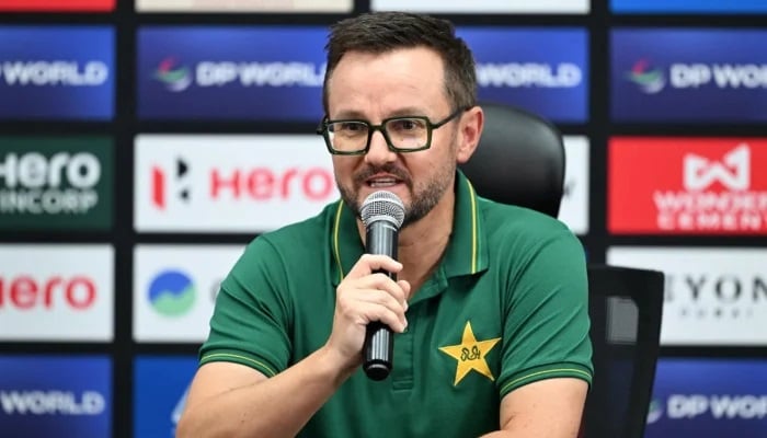 Pakistans white-ball head coach Mike Hesson speaks to the media at the Dubai International Cricket Stadium on September 11, 2025. — AFP