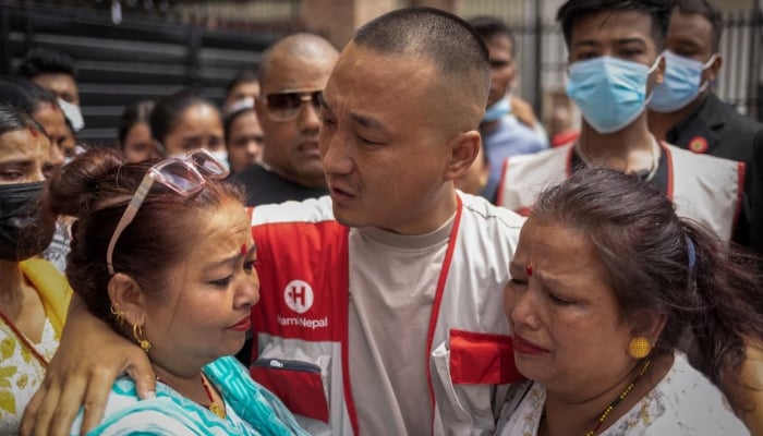 Sudan Gurung, 36, founder of Hami Nepal, cries after meeting the family members of the victims, who died following last weeks deadly anti-corruption protests, outside a morgue at a hospital, in Kathmandu, Nepal, September 13, 2025. — Reuters