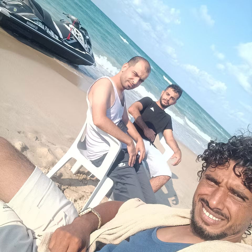 A Muhammad Abu Dakha, a 31-year-old Palestinian from Gaza, poses for a selfie before sailing with two other Palestinian migrants to Lampedusa, Italy, on a jet ski to seek asylum, near Khums, Libya, August 17, 2025.  — Reuters