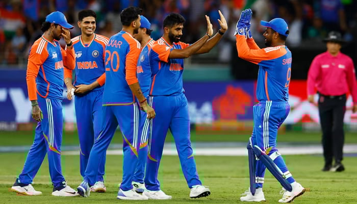 Indias Jasprit Bumrah celebrates with teammates after taking a wicket during a match at the Dubai International Cricket Stadium, Dubai, United Arab Emirates, on Sept 14, 2025. — Reuters