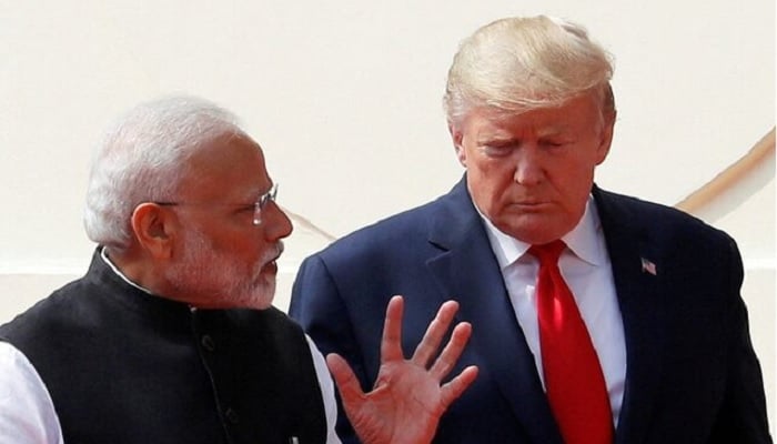 U.S. President Donald Trump and Indias Prime Minister Narendra Modi talk as they arrive for a joint news conference after bilateral talks at Hyderabad House in New Delhi, India, February 25, 2020. —Reuters