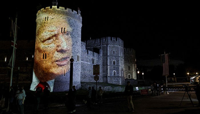 An image of U.S. President Donald Trump is projected on Windsor castle, after U.S. President Donald Trump and first lady Melania Trump arrival for a state visit to the country, in Windsor, Berkshire, Britain September 16, 2025. — Reuters