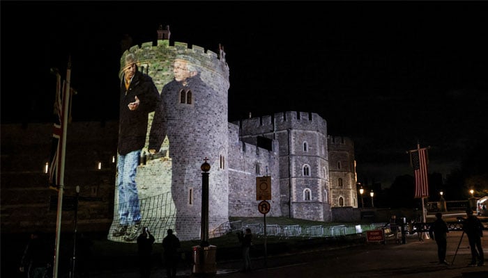 Britains Prince Andrew alongside disgraced financier Jeffrey Epstein is projected on Windsor castle, after U.S. President Donald Trump and first lady Melania Trump arrival for a state visit to the country, in Windsor, Berkshire, Britain September 16, 2025. REUTERS/Phil Noble