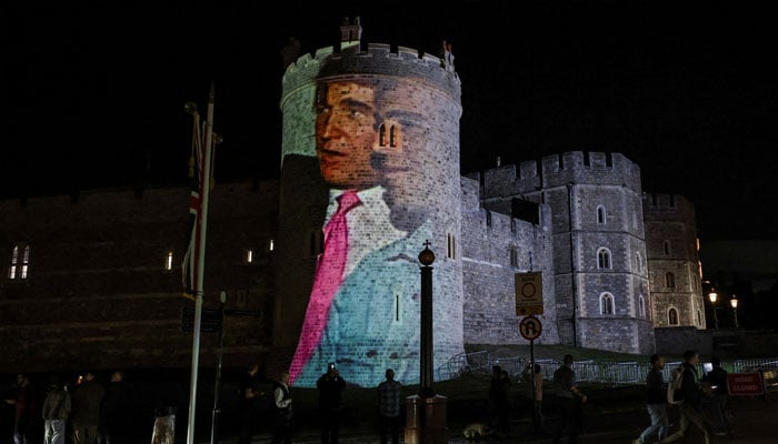 U.S. President Donald Trump alongside disgraced financier Jeffrey Epstein is projected on Windsor castle, in Windsor, Berkshire, Britain September 16, 2025. REUTERS/Phil Noble