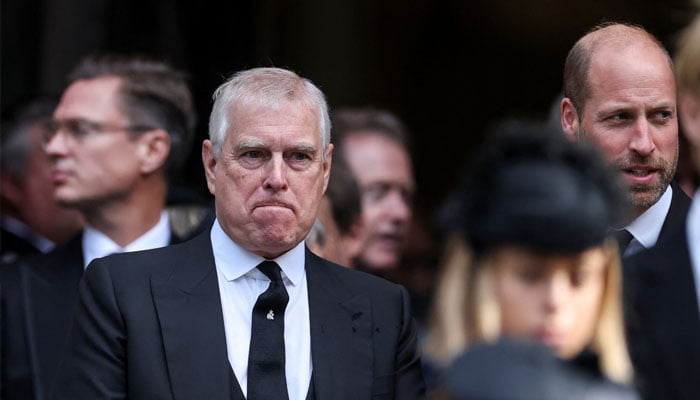 Britains Prince Andrew stands next to Prince William at the end of the Requiem Mass, on the day of the funeral of Britains Katharine, Duchess of Kent, at Westminster Cathedral in London, Britain, September 16, 2025. REUTERS/Toby Melville