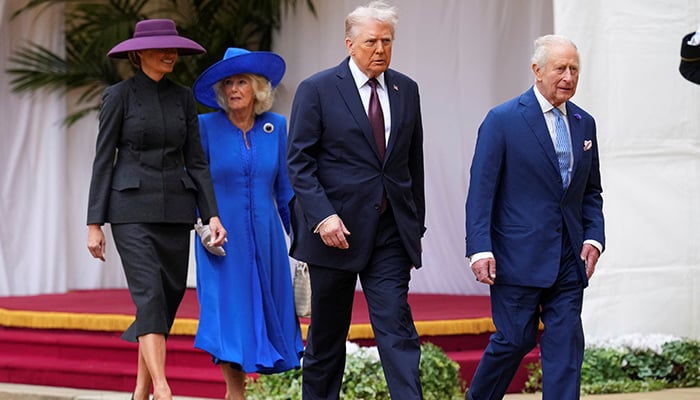 President Donald Trump and Britains King Charles III walk to review the Guard of Honour followed by Queen Camilla and Melania Trump at Windsor Castle in Windsor, England, Wednesday, September 17, 2025. — Reuters