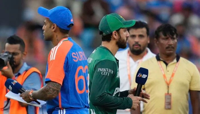Indian skipper Suryakumar Yadav (left) and Pakistan captain Salman Ali Agha after toss during Asia Cup 2025 clash at Dubai International Cricket Stadium, Dubai, UAE, September 14, 2025. — X@fad08