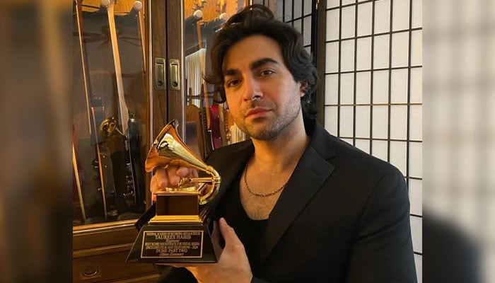 Taurees Habib, along with his trophy, poses for a photo. — Facebook@taurees.habib