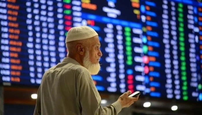 Broker is busy in trading at the Pakistan Stock Exchange (PSX) in Karachi on Wednesday, October 23, 2024. — PPI