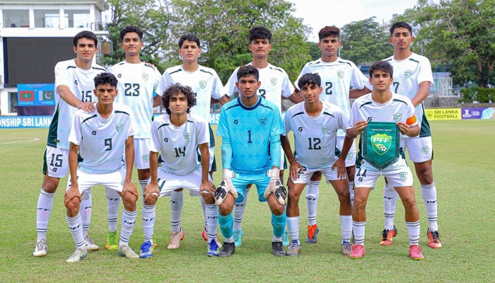 The Pakistan football team posing after winning its second straight win at the SAFF U-17 Championship.—Reporter