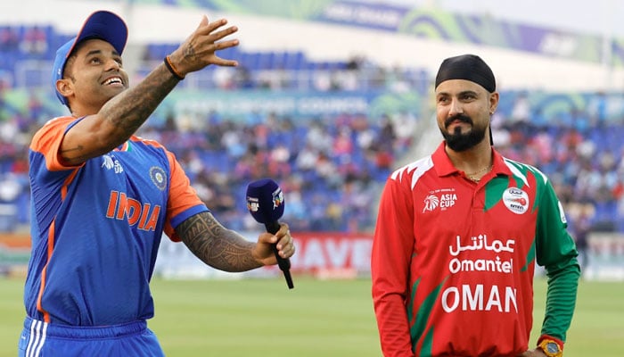 India captain Suryakumar Yadav (left) and Omans Jatinder Singh at the toss for their ACC Mens T20 Asia Cup 2025 match at the Zayed Cricket Stadium in Abu Dhabi on September 19, 2025. — ACC